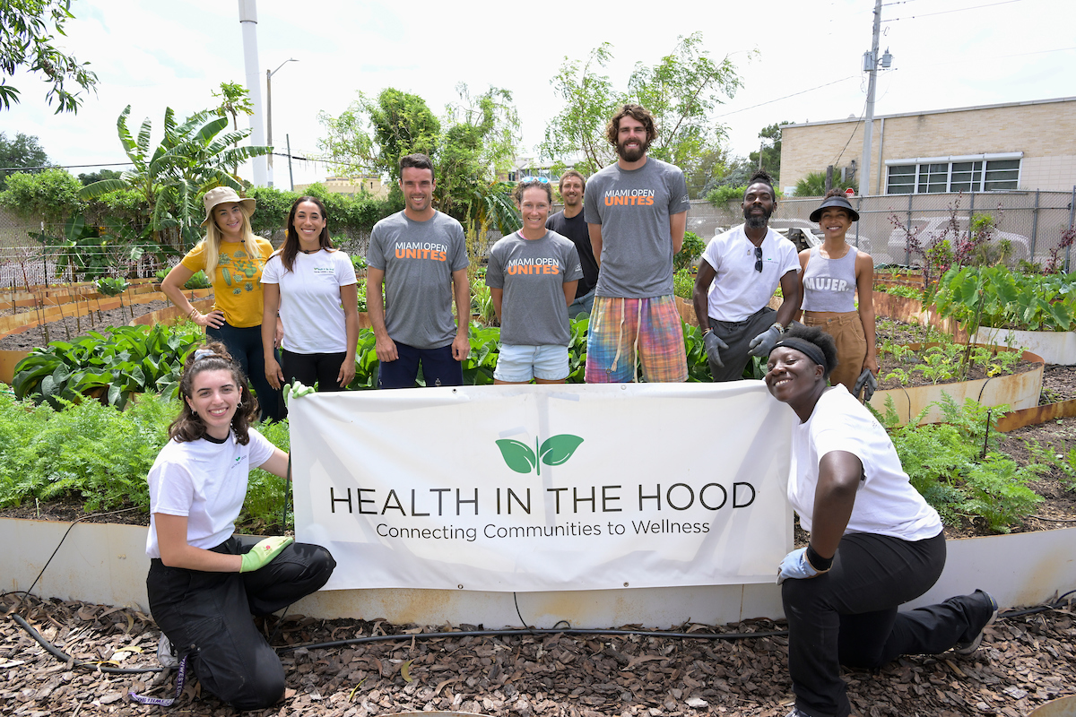 volunteer photo at health in the hood community garden for miami open service