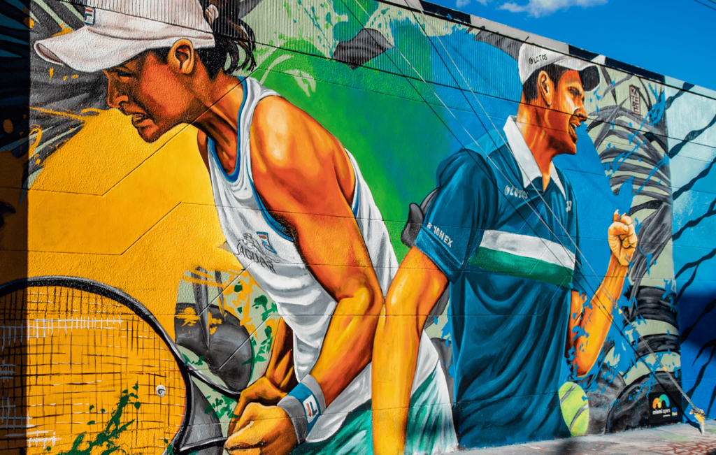 Image of a Mural by Nate Dee Featuring Ashleigh Barty and Hubert Hurkacz Image of a Mural by Nate Dee Featuring Ashleigh Barty and Hubert Hurkacz