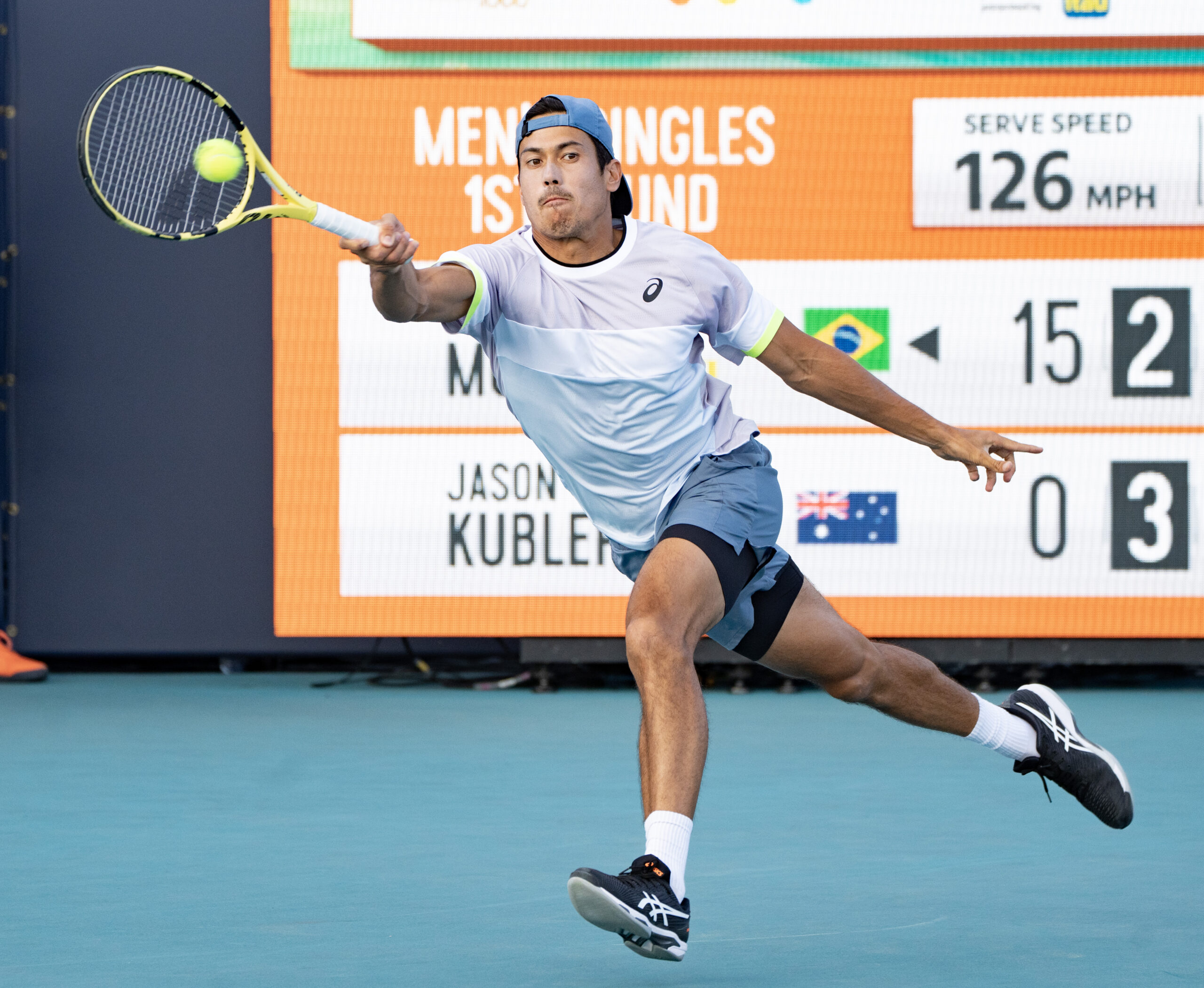 Jason Kubler stretches for a forehand during the 2023 Miami Open