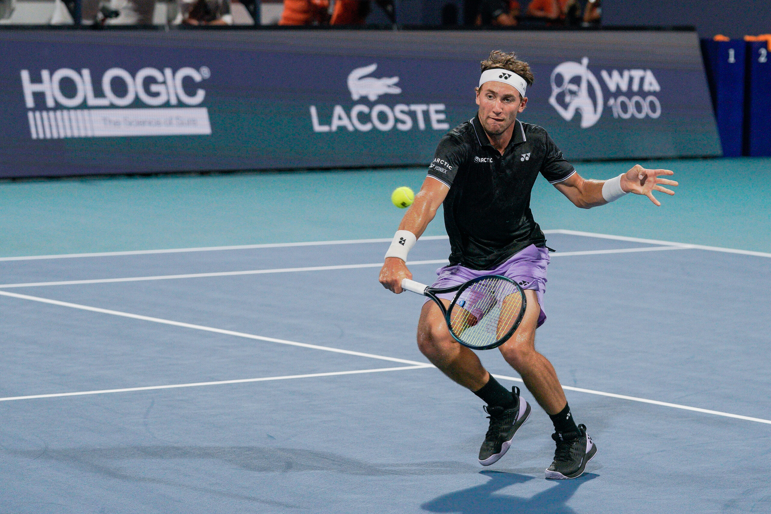 Casper Ruud hitting a volley at the 2023 Miami Open in Miami Gardens, FLA.