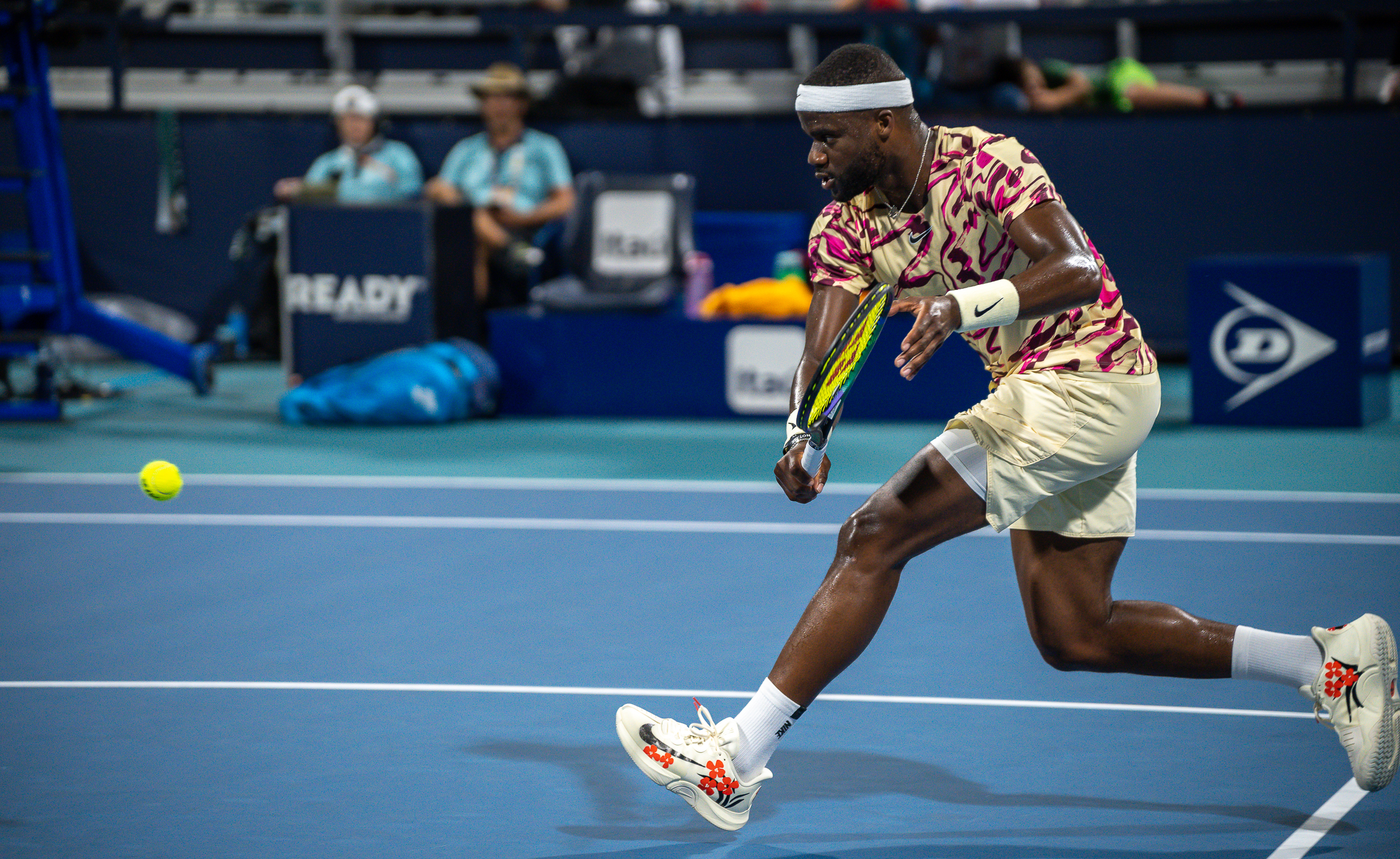 Frances Tiafoe leans in to slice a backhand during his match against Yosuke Watanuke on March 25 at the 2023 Miami Open.