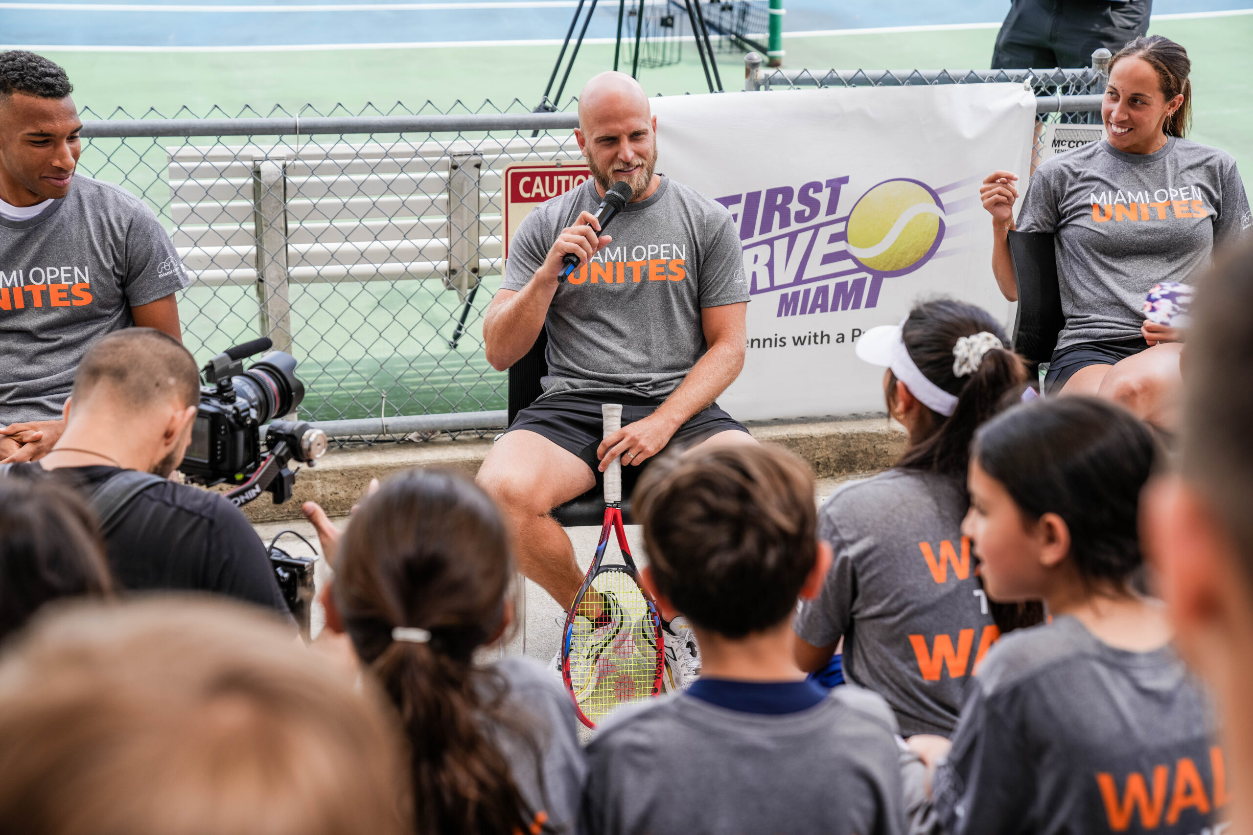 Denis Kudla address the kids at the Big Brothers, Big Sisters event at Moore Park in Miami on March 20, 2023.