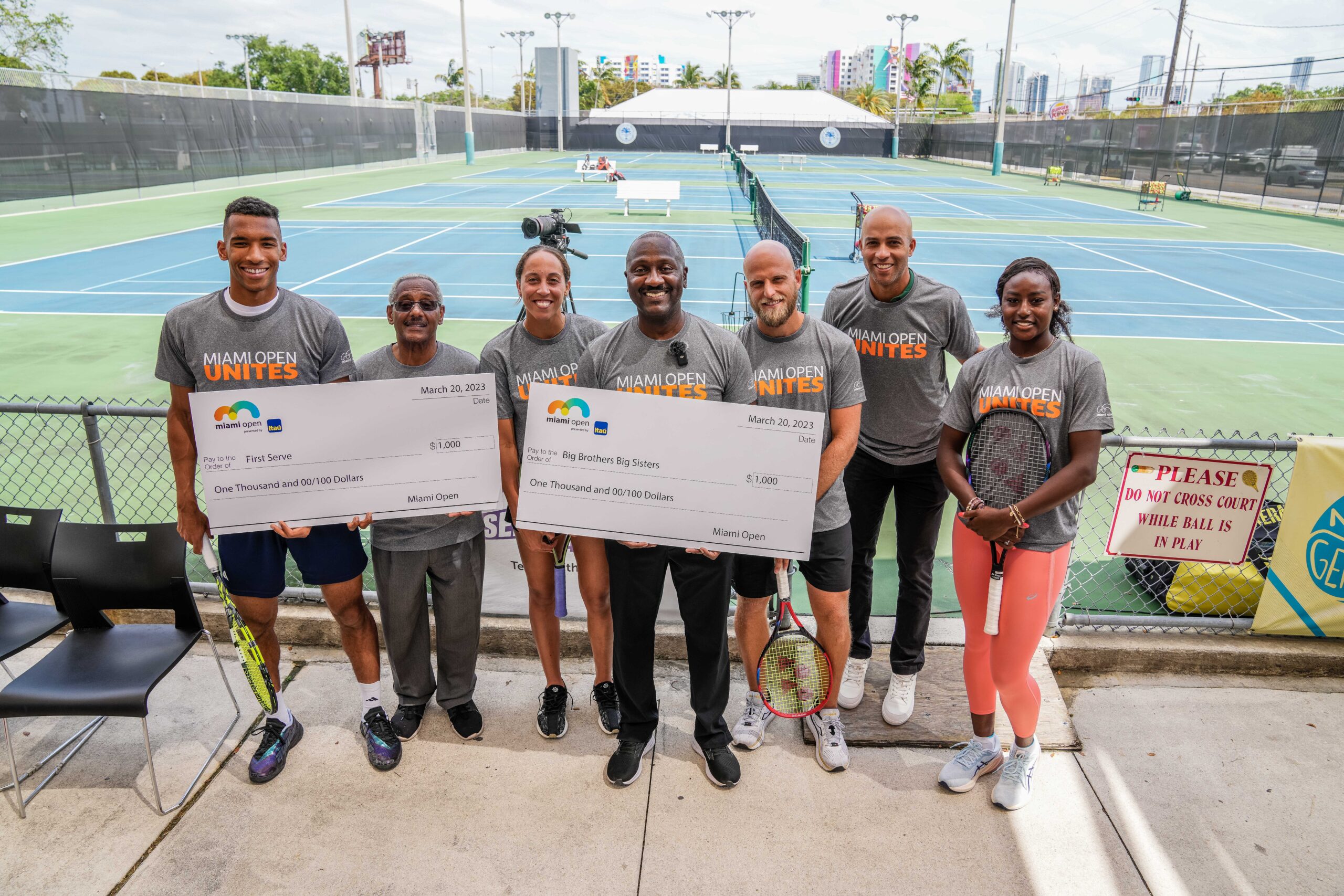 ATP Players Felix Auger Aliassime and Denis Kudla, with WTA Players Madison Keys and Alycia Parks, along with Miami Open Tournament Director, James Blake during the Big Brothers, Big Sisters event at Moore Park, in Miami on March 20, 2023.