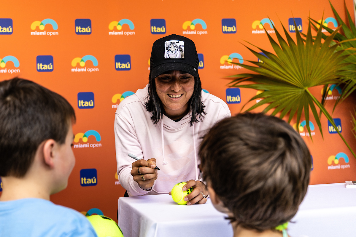 Ons Jabeur of Tunisia meets young fans during the Miami Open tennis tournament, Tuesday, Mar. 21, 2023,