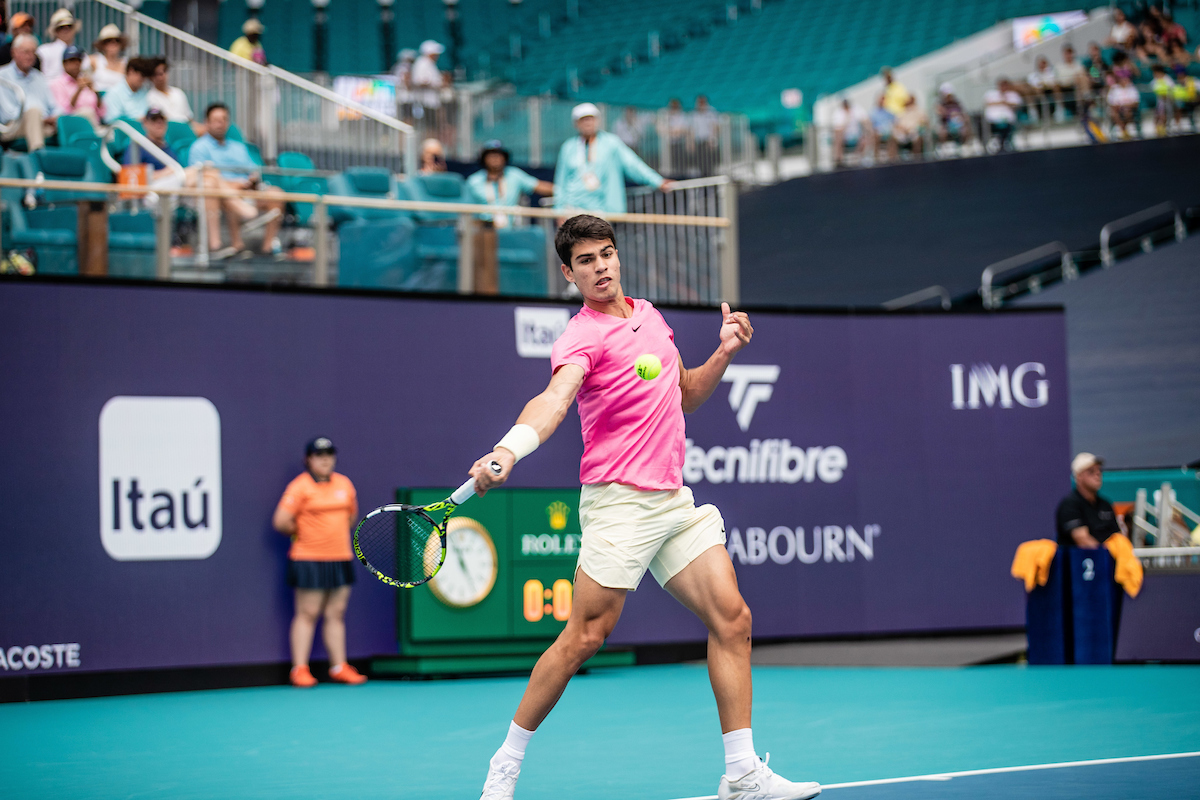 Carlos Alcaraz lines up for a forehand during his first round match at the 2023 Miami Open.