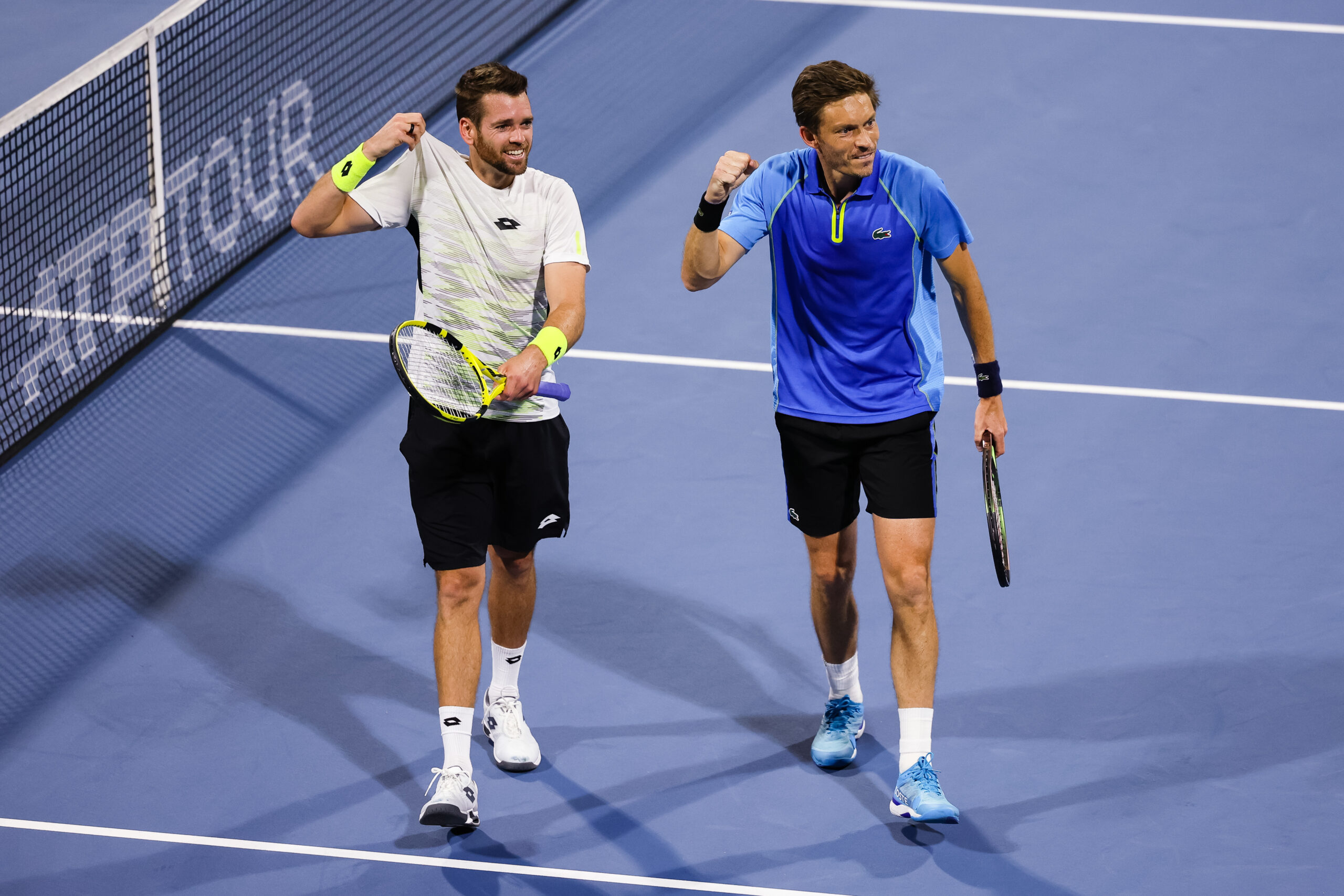 Austing Krajicek (left) and partner Nicolas Mahut are happy after reaching the finals of the 2023 Miami Open in Miami Gardens, Florida.