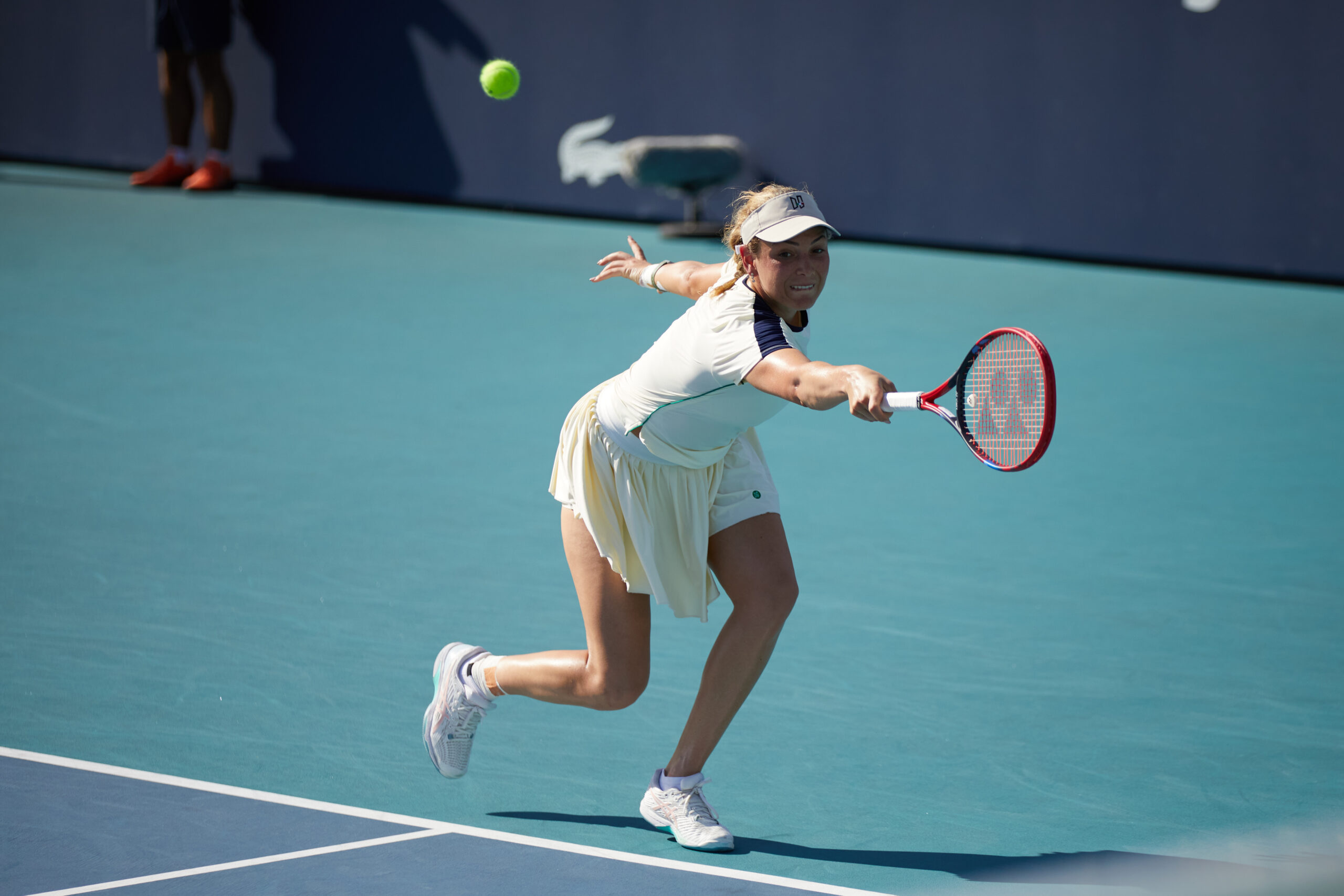 Donna Vekic stretches wide for a backhand during her match against Petra Kvitova on March 26 at the 2023 Miami Open in Miami Gardens, FL.