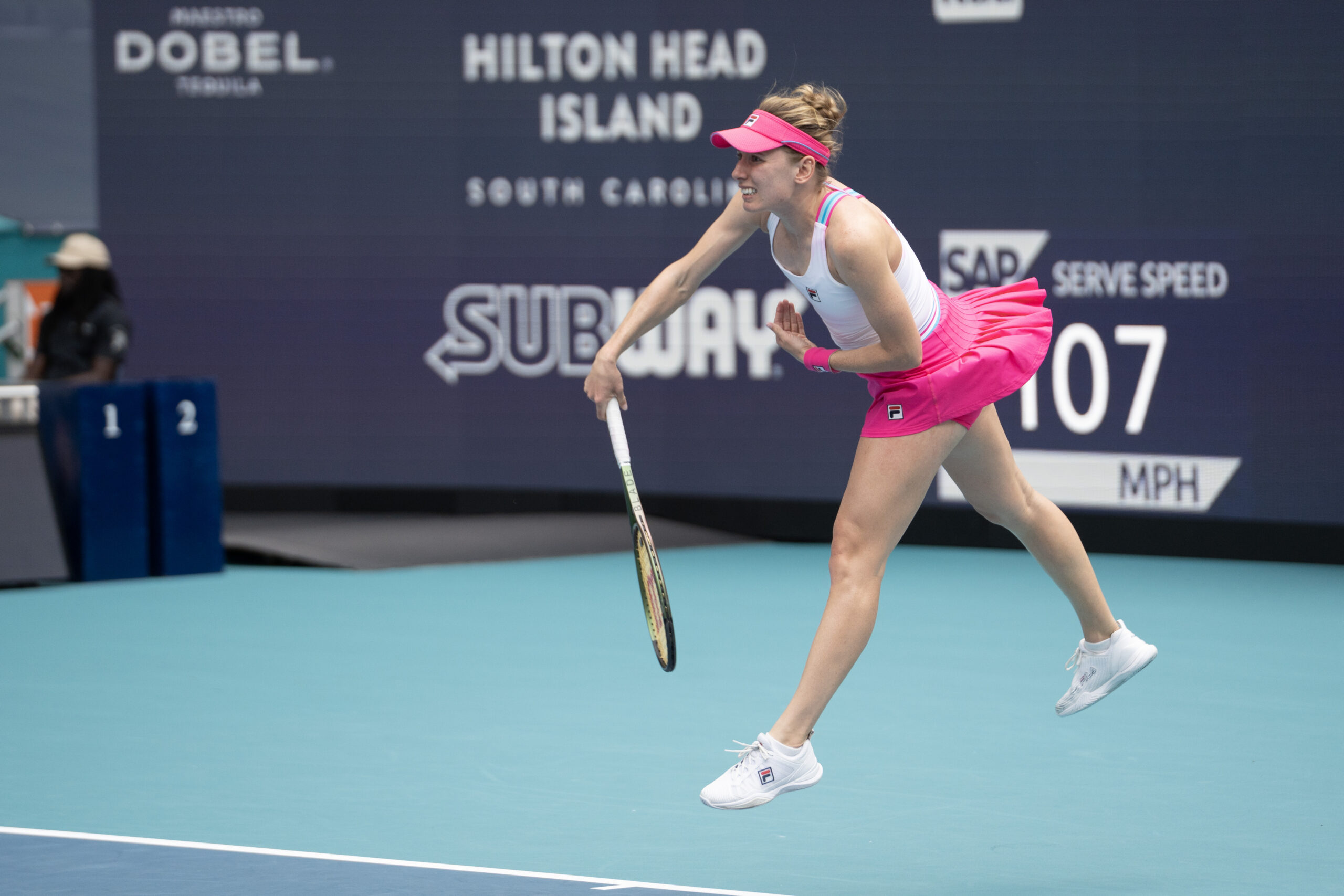 Ekaterina Alexandrova serves to Petra Kvitova at the 2023 Miami Open in Miami Gardens, Florida.