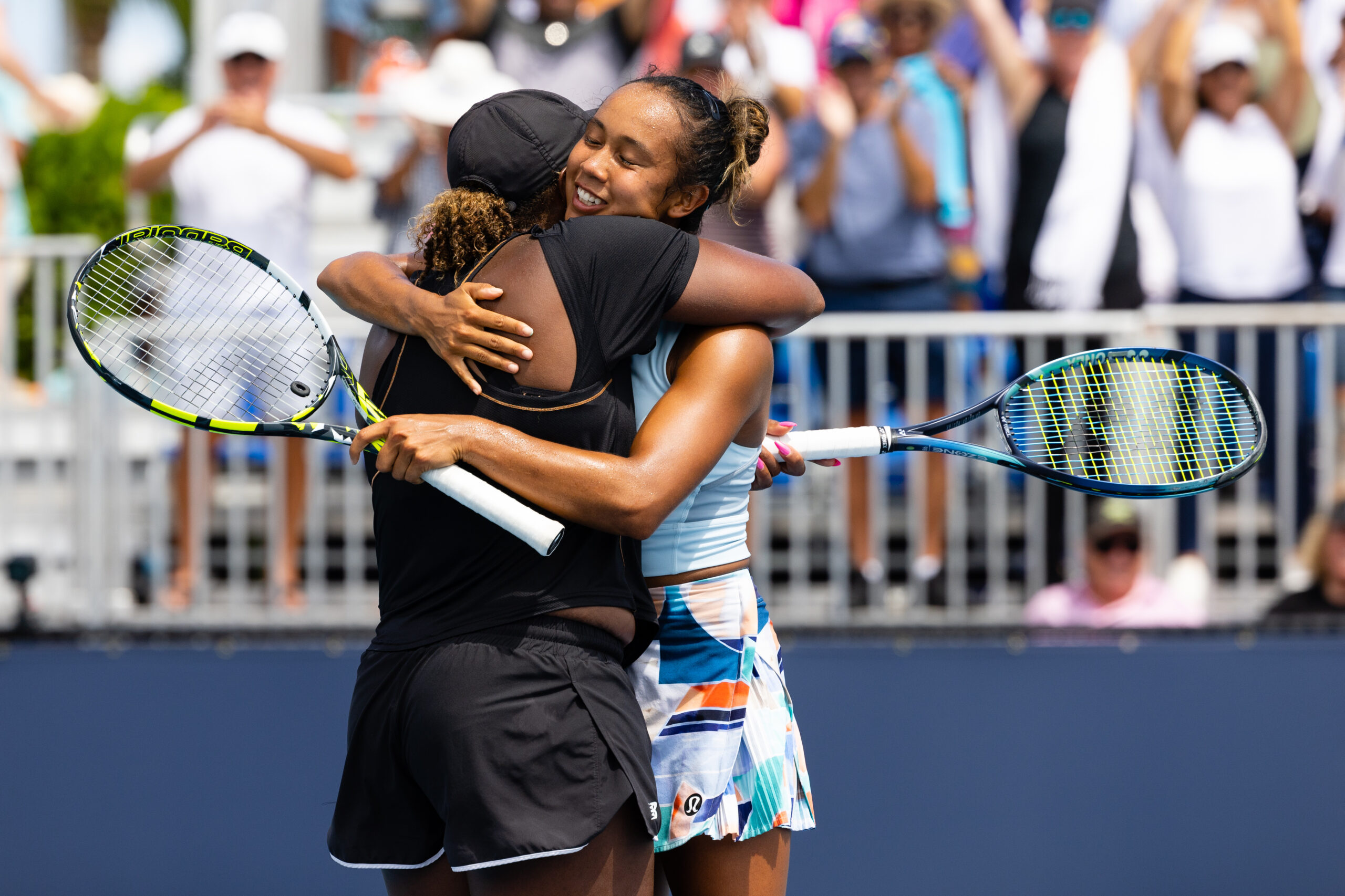 Taylor Townsend hugs doubles partner Leylah Fernandez during the 2023 Miami Open in Miami Gardens, Florida.
