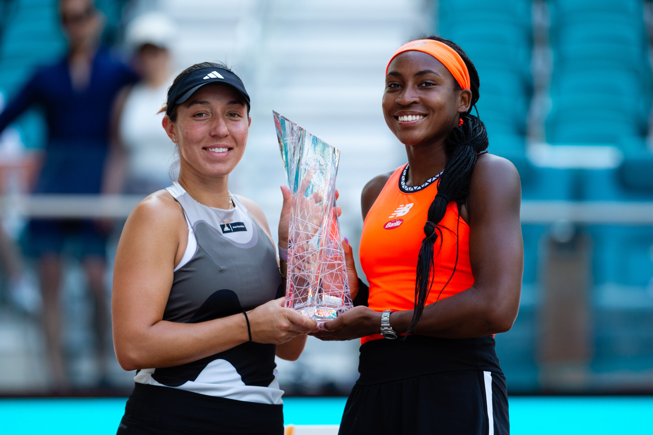 Jessica Pegula and Coco Gauff, Women's Doubles Champions at the 2023 Miami Open hold their trophy.