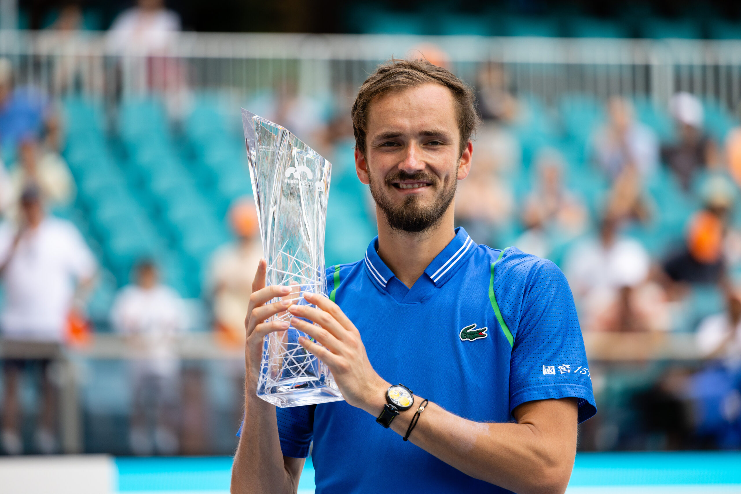 Daniil Medvedev, 2023 Miami Open Men's Singles Champion smiles as he poses with the trophy at Hard Rock Stadium on April 2, 2023.