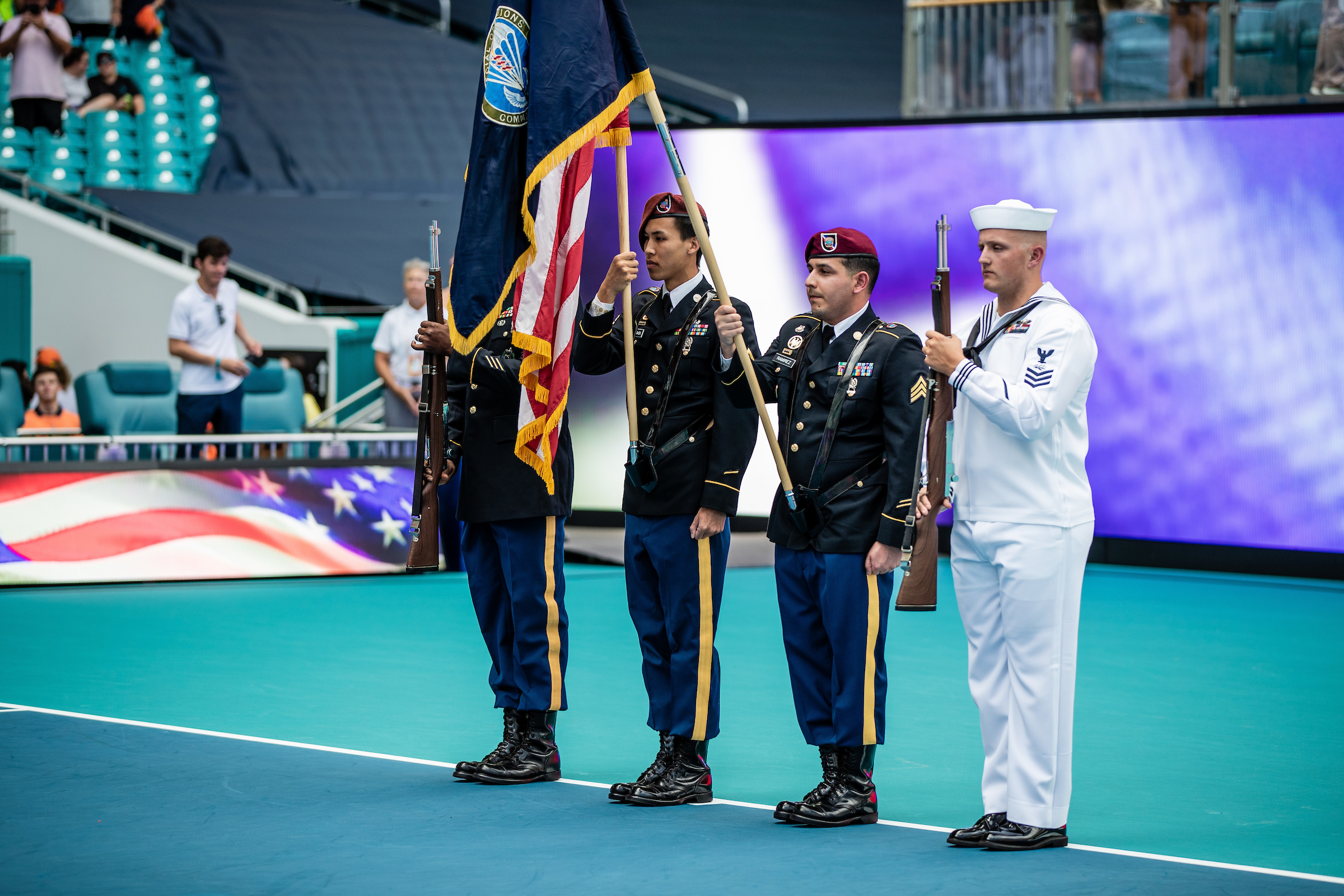 Members of the Color Guard before the Women's Championship match at the 2023 Miami Open in Miami Gardens, Florida.
