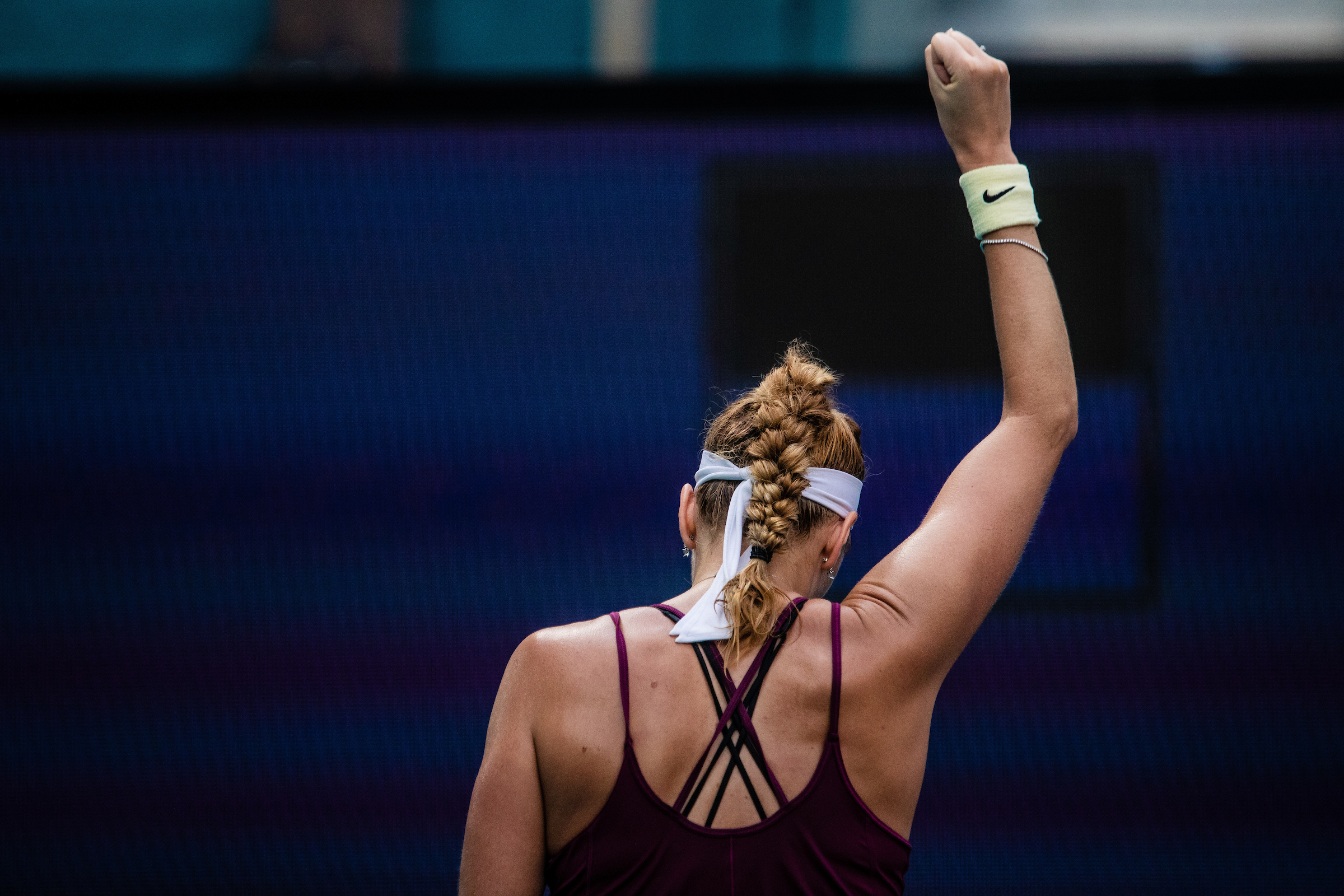 2023 Miami Open Women's Singles Champion Petra Kvitova raises her arm during the championship match at the Miami Open in Miami Gardens, Florida.