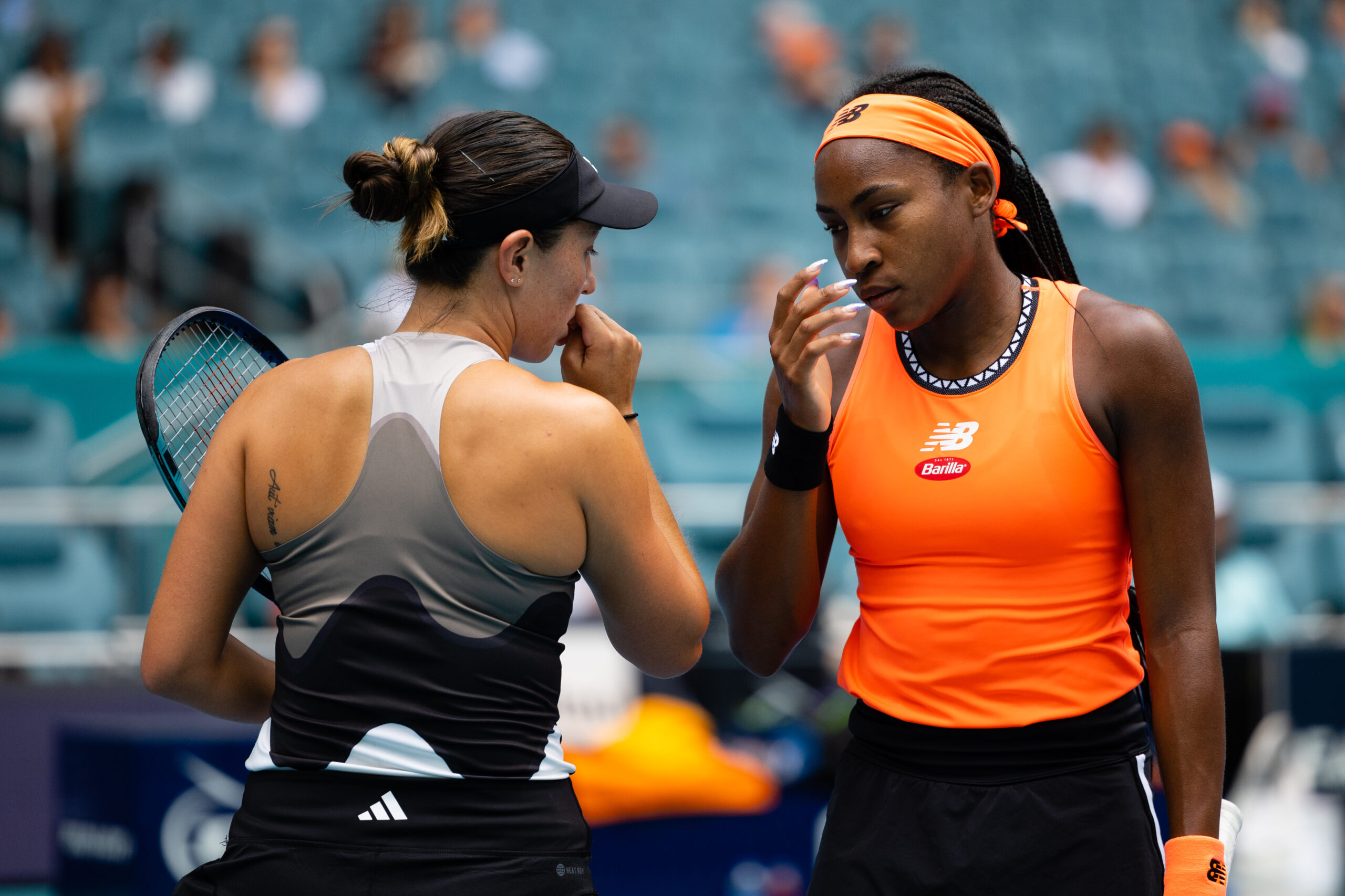 Jessica Pegula and Coco Gauff discuss strategy during the 2023 Miami Open Women's Doubles Final on April 2, 2023.