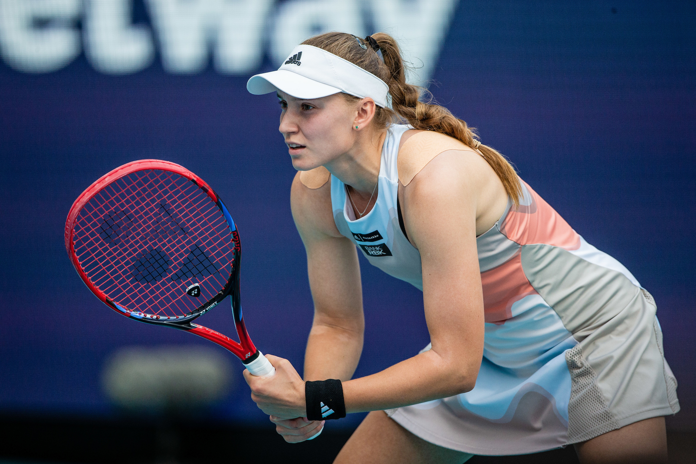 Elena Rybakina is ready for a Petra Kvitova serve during the ladies singles championship at the 2023 Miami Open.