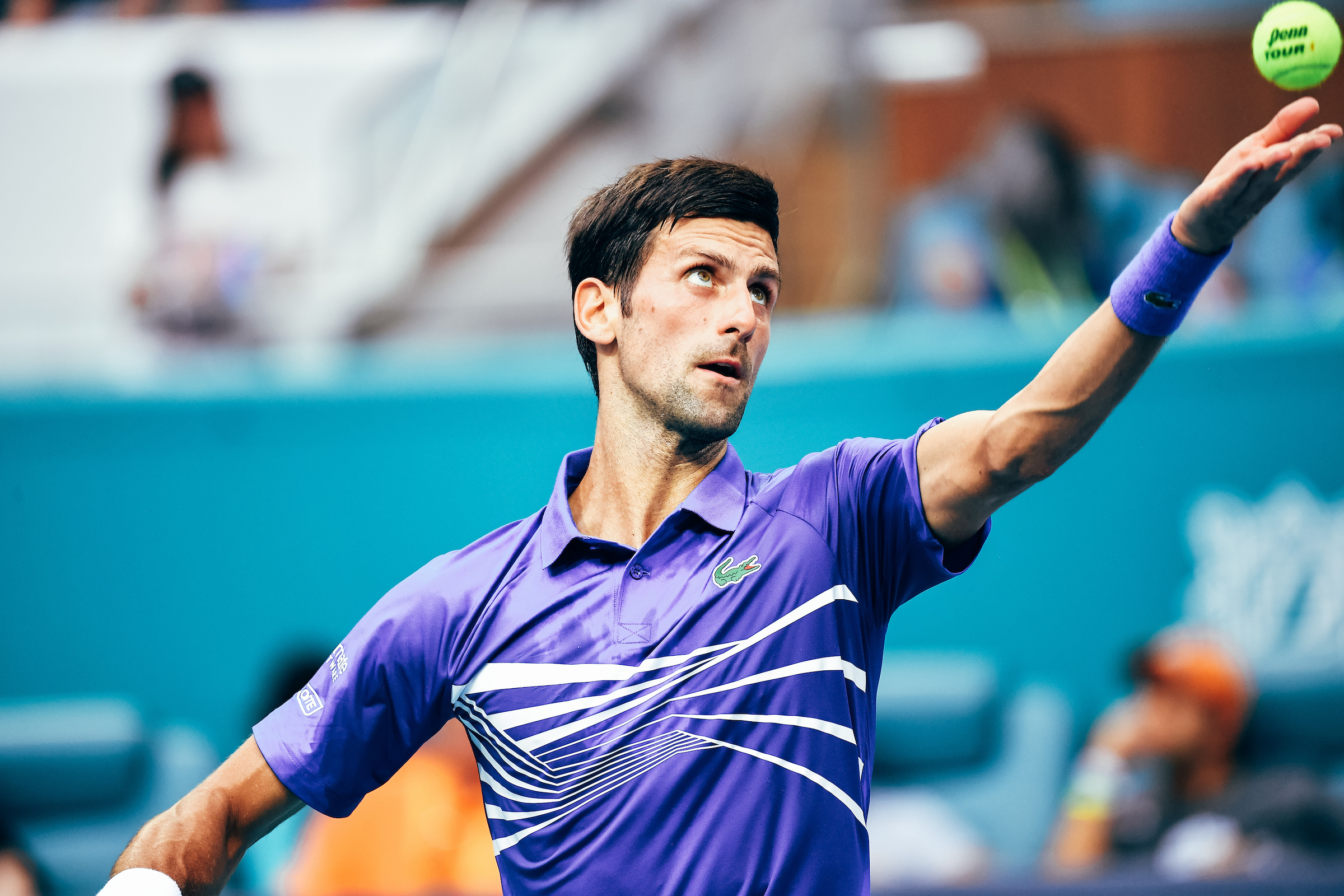 Novak Djokovic serving during one of his matches at the Miami Open at Hard Rock Stadium in Miami Gardens, FL.