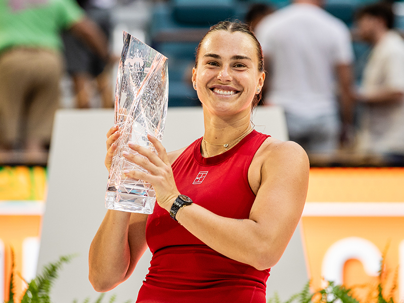 Danielle Collins smiles with her trophy after winning at the 2024 Miami Open.
