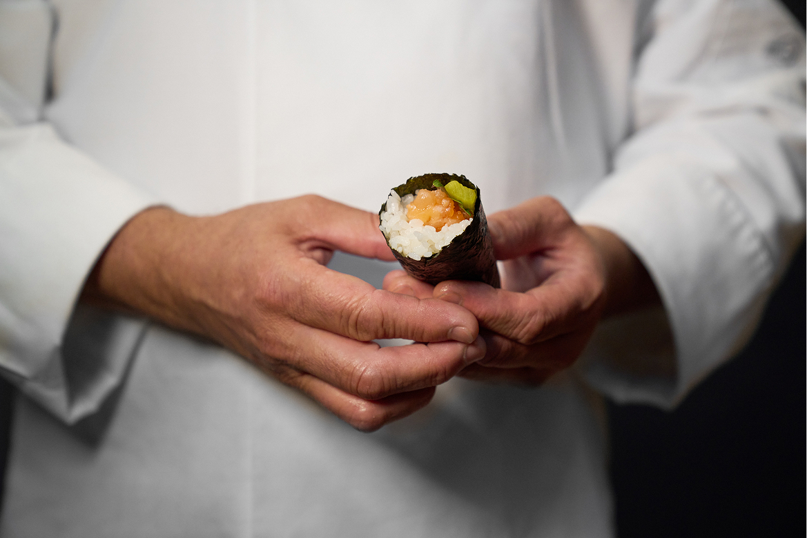 hand roll in chefs hand