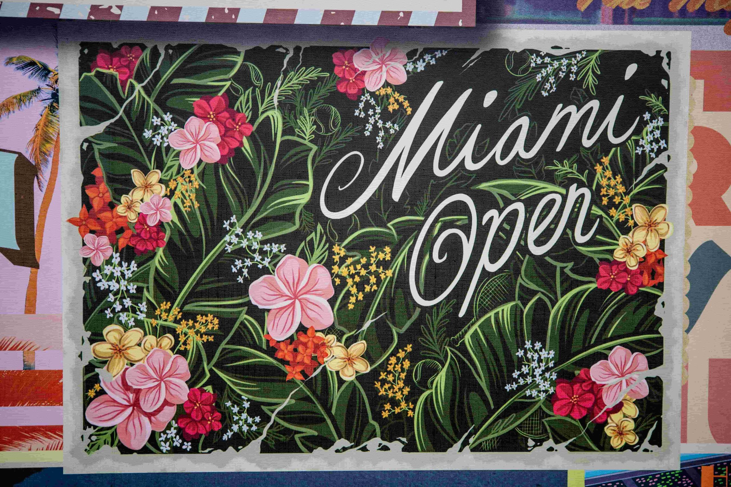 Picture of a wall art in colorful floral theme with the letters for Miami Open in white