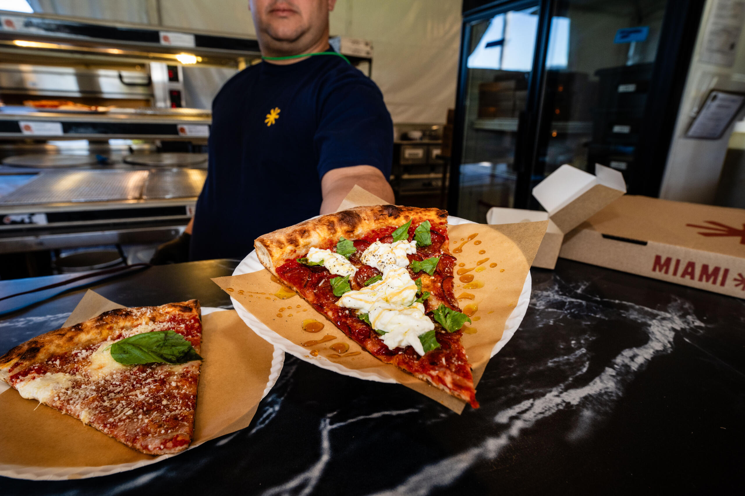 A slice of margherita pizza from Miami Slice.