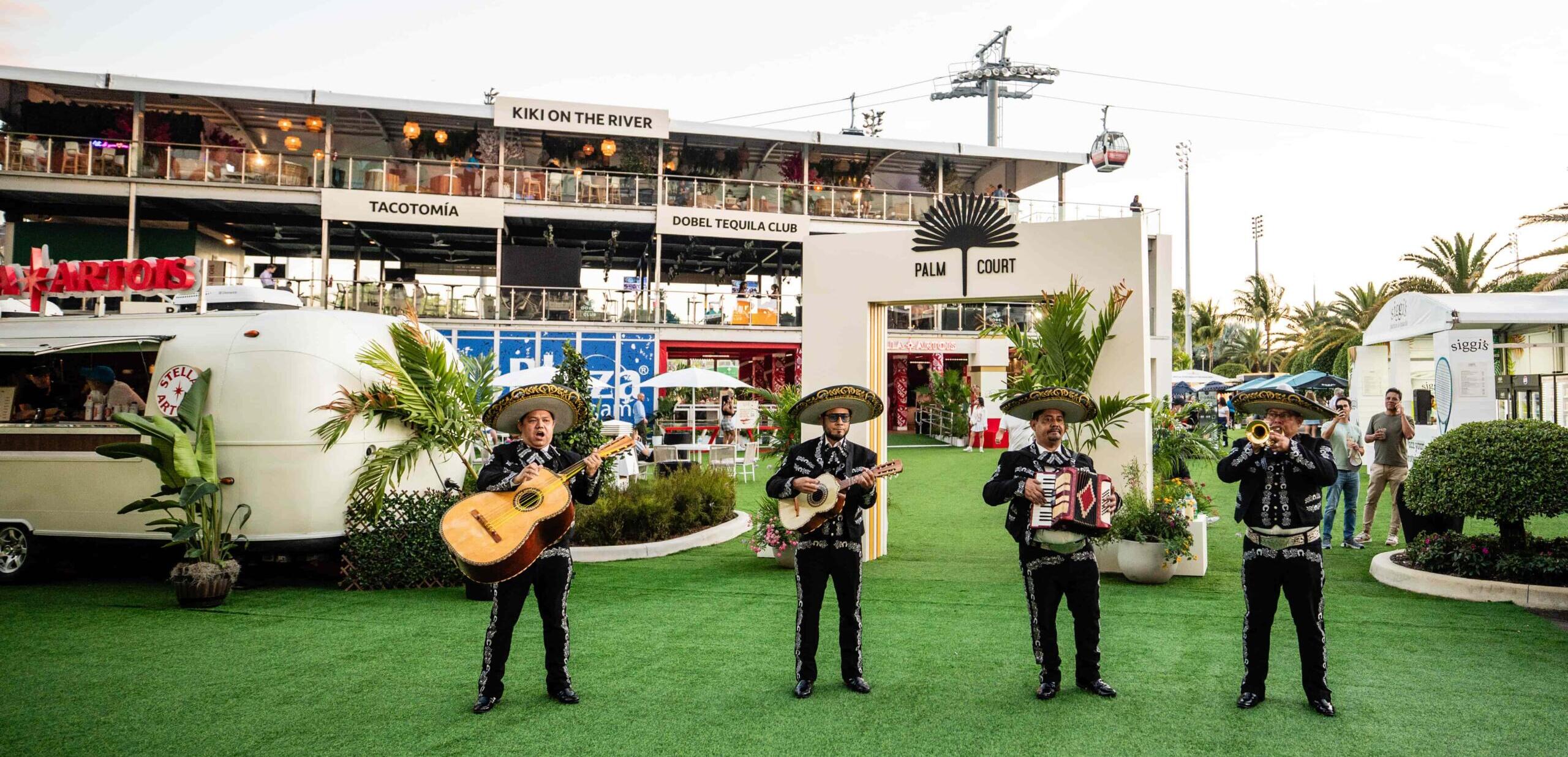 Picture of Mariachi group playing for fans in the event