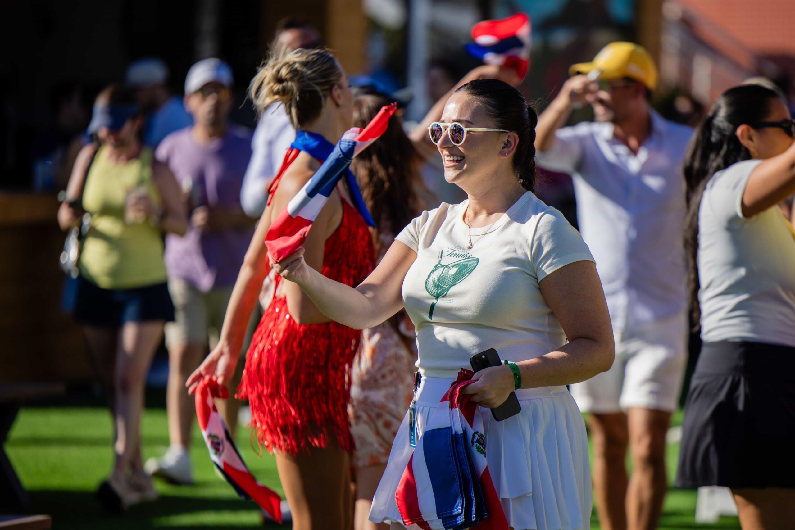 Miami Open fan celebrates hispanic heritage day event with flags