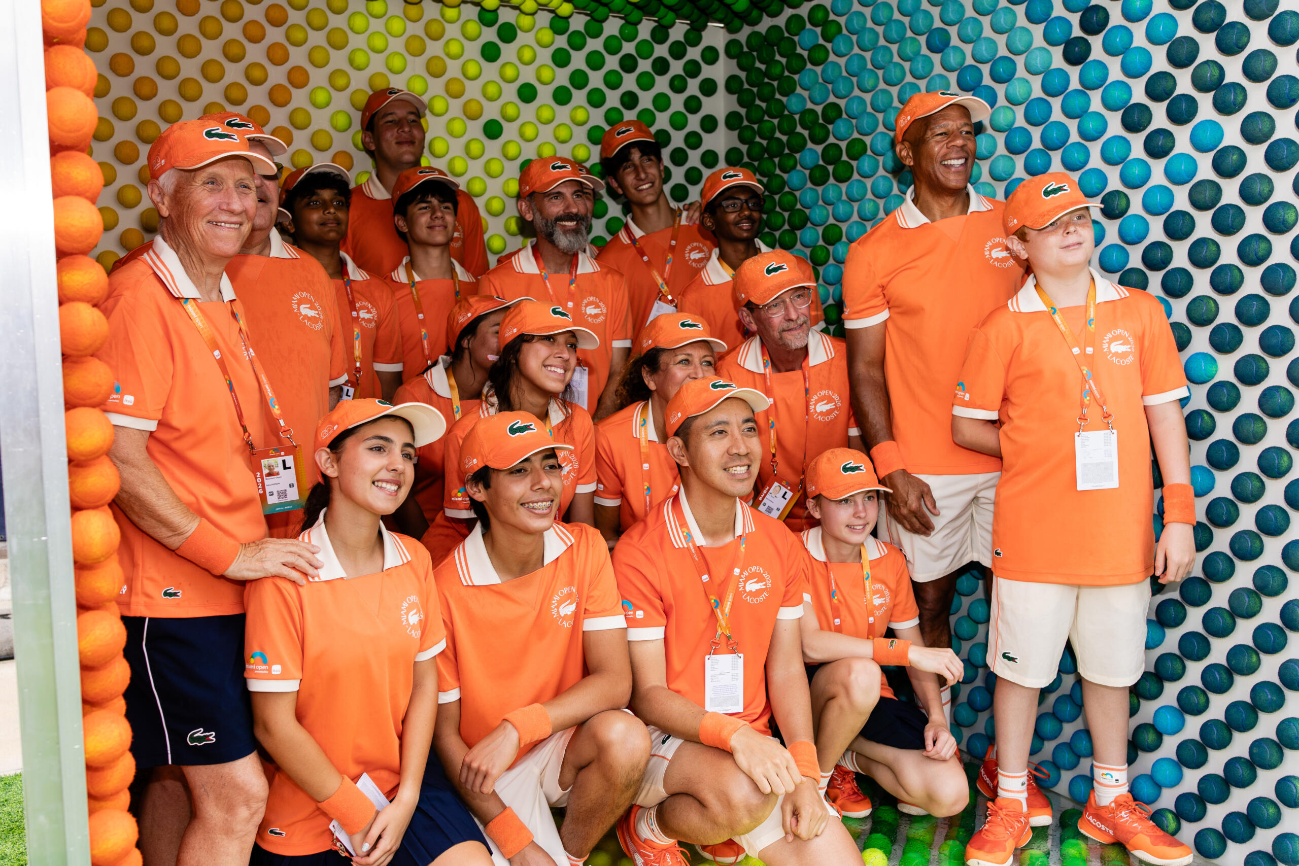 Ballperson's pose together.