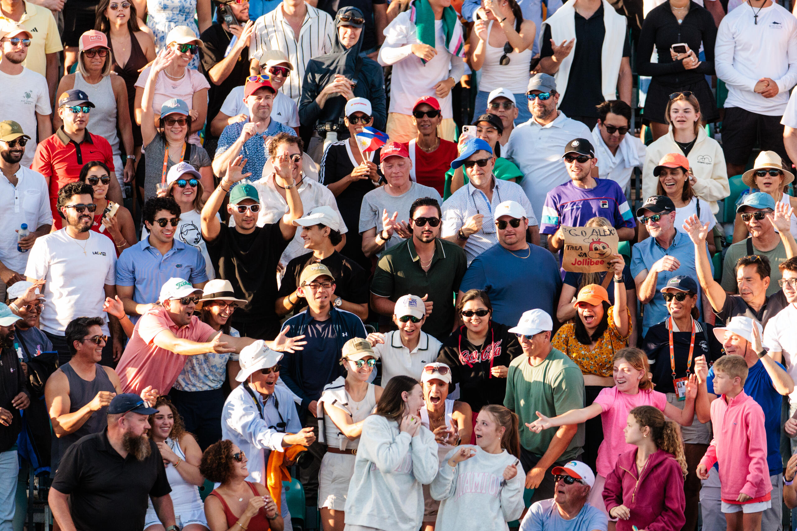 A crowd of fans reacts at the Miami Open