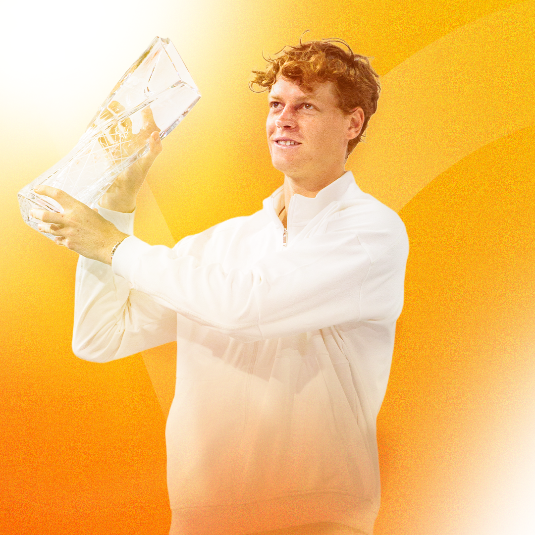 2025 Miami Open men's singles champion Jakub Mensik kisses his trophy after his victory.