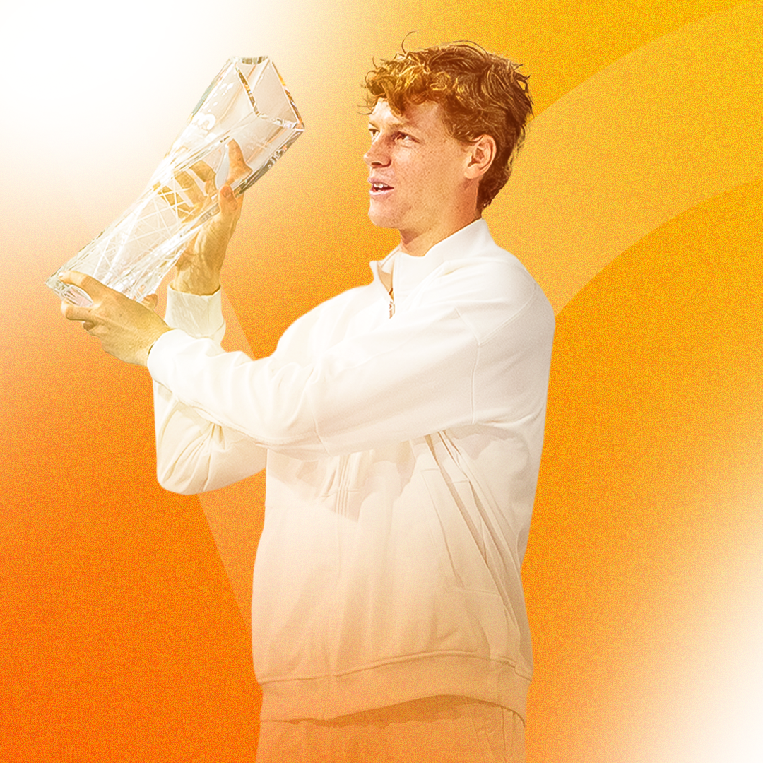 2025 Miami Open men's singles champion Jakub Mensik kisses his trophy after his victory.