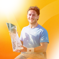 Men’s Wheelchair Singles 2025 Miami Open men's singles champion Jakub Mensik kisses his trophy after his victory.