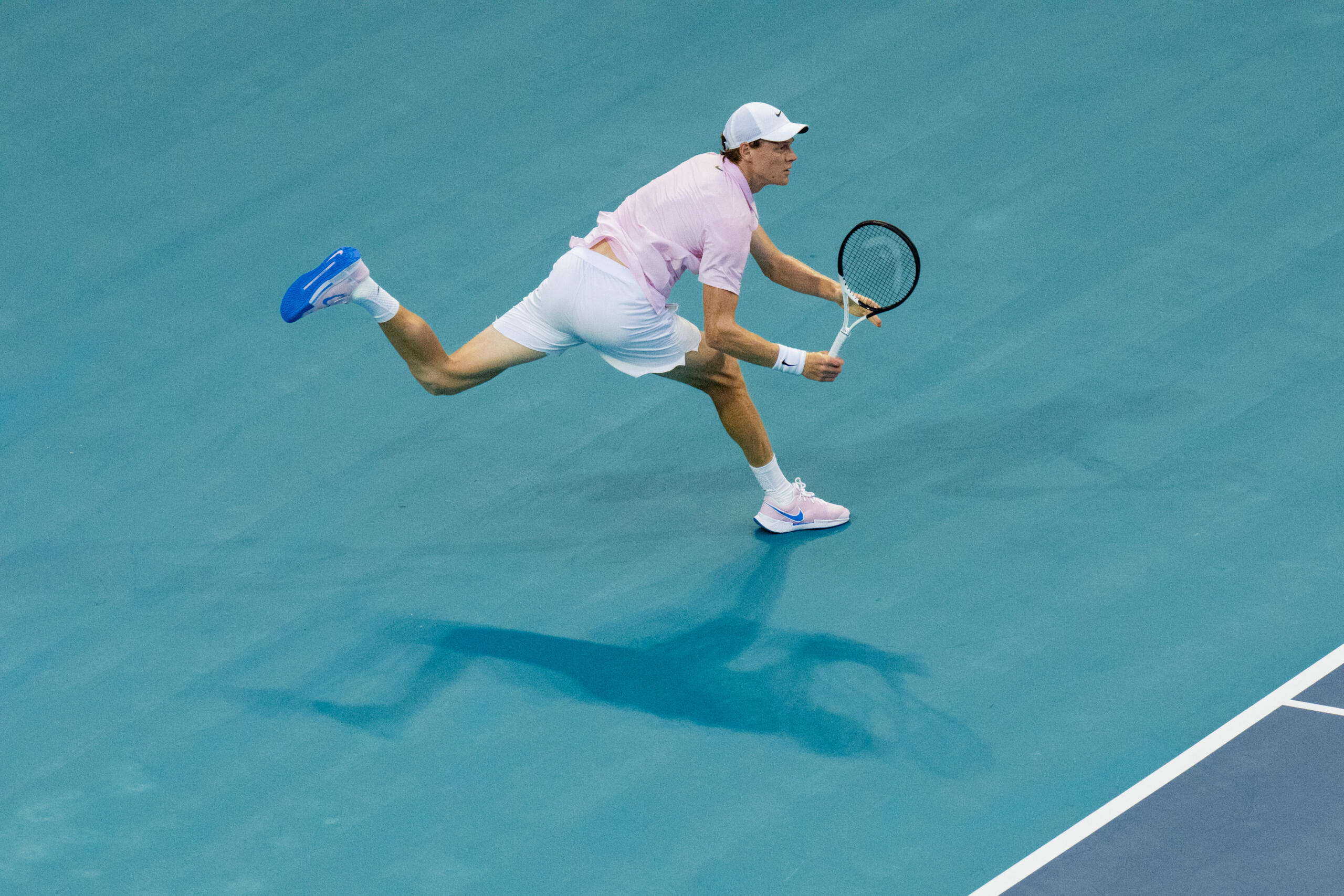 Jannik Sinner returns a serve in his 2026 Miami Open victory